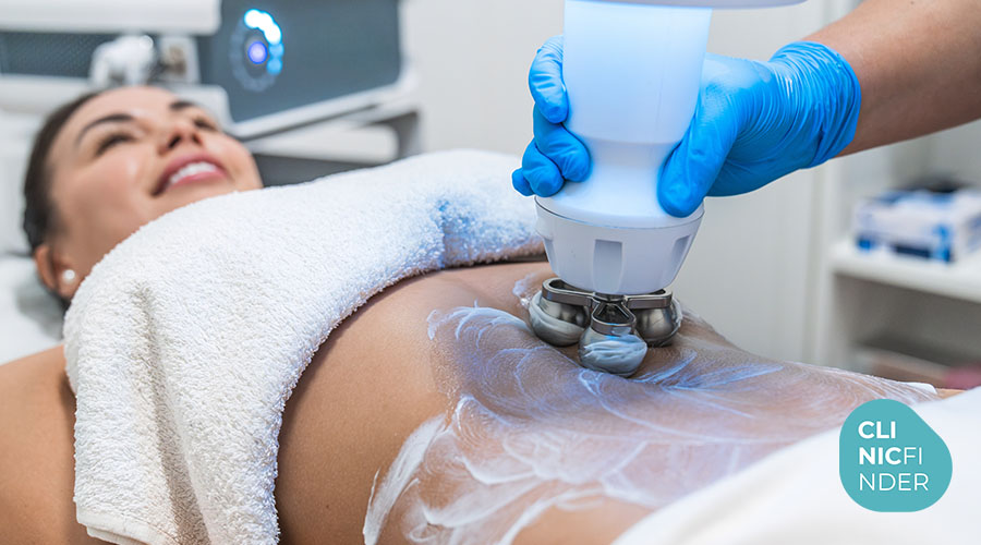 Practitioner moving an ultrasound body-contouring handpiece across a patient’s abdomen